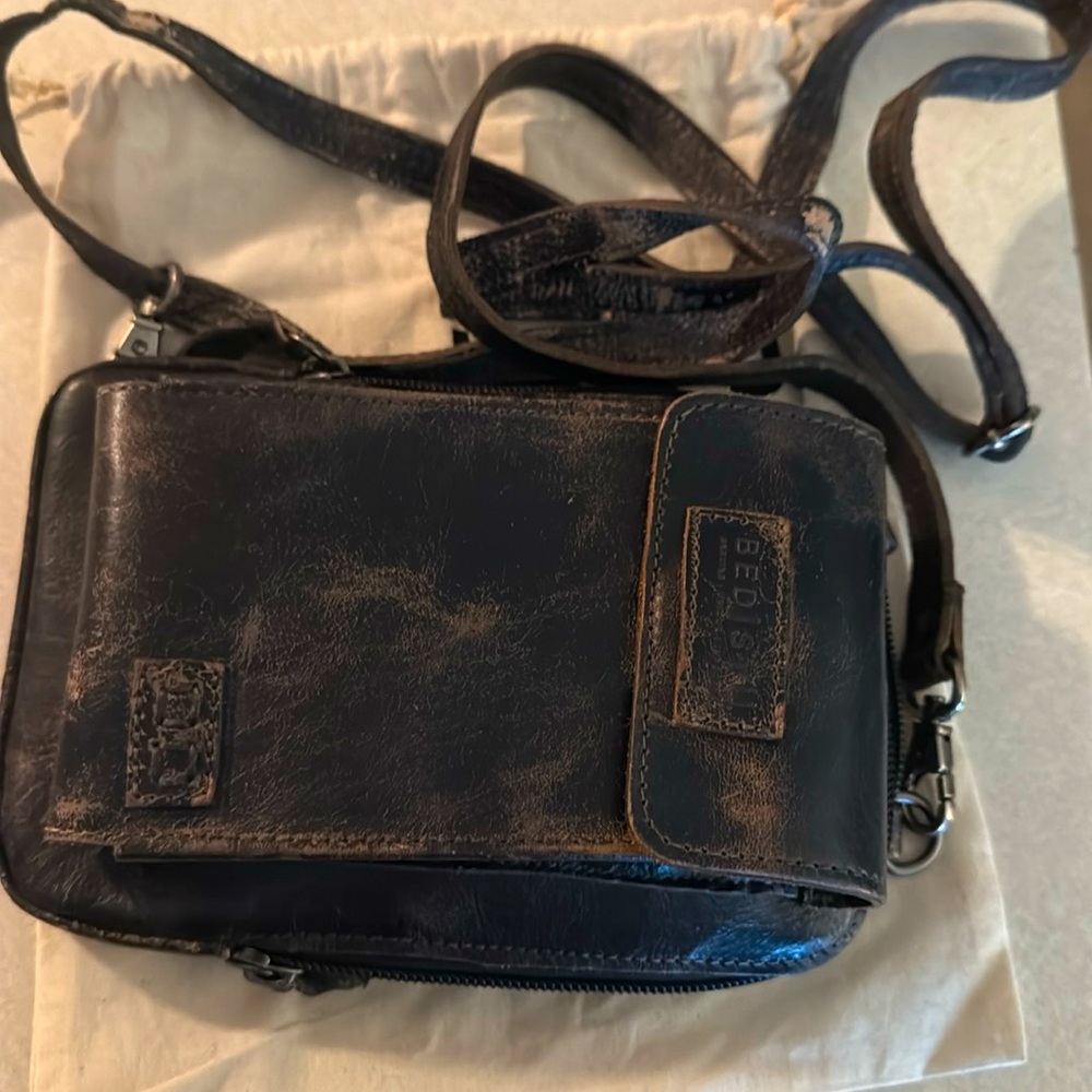 NWOT
Perfect Condition with bag